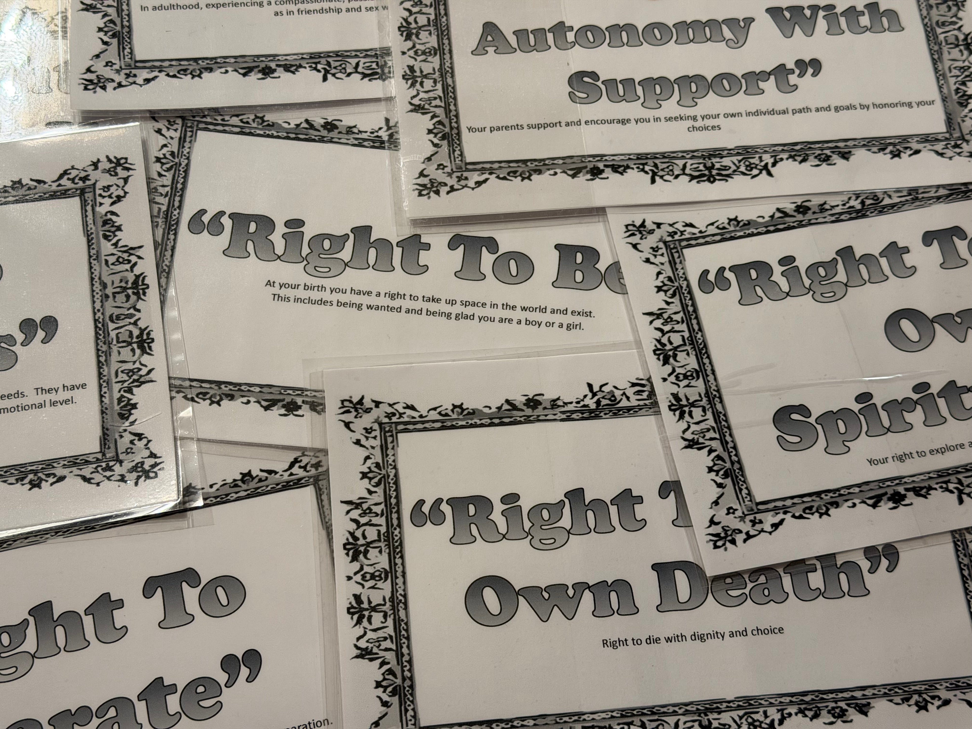 Collection of printed cards with text on a white background